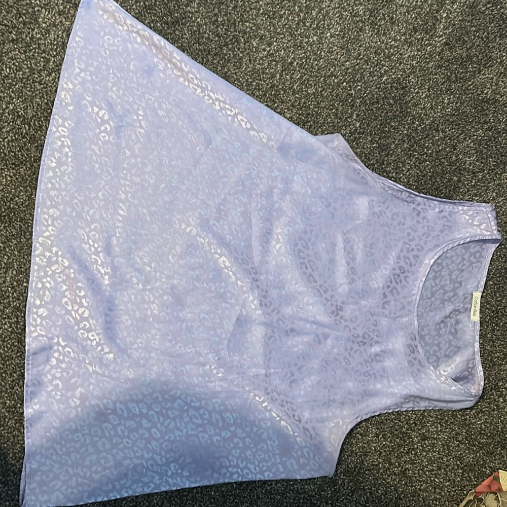 Tank top with cheetah print. Silk material.